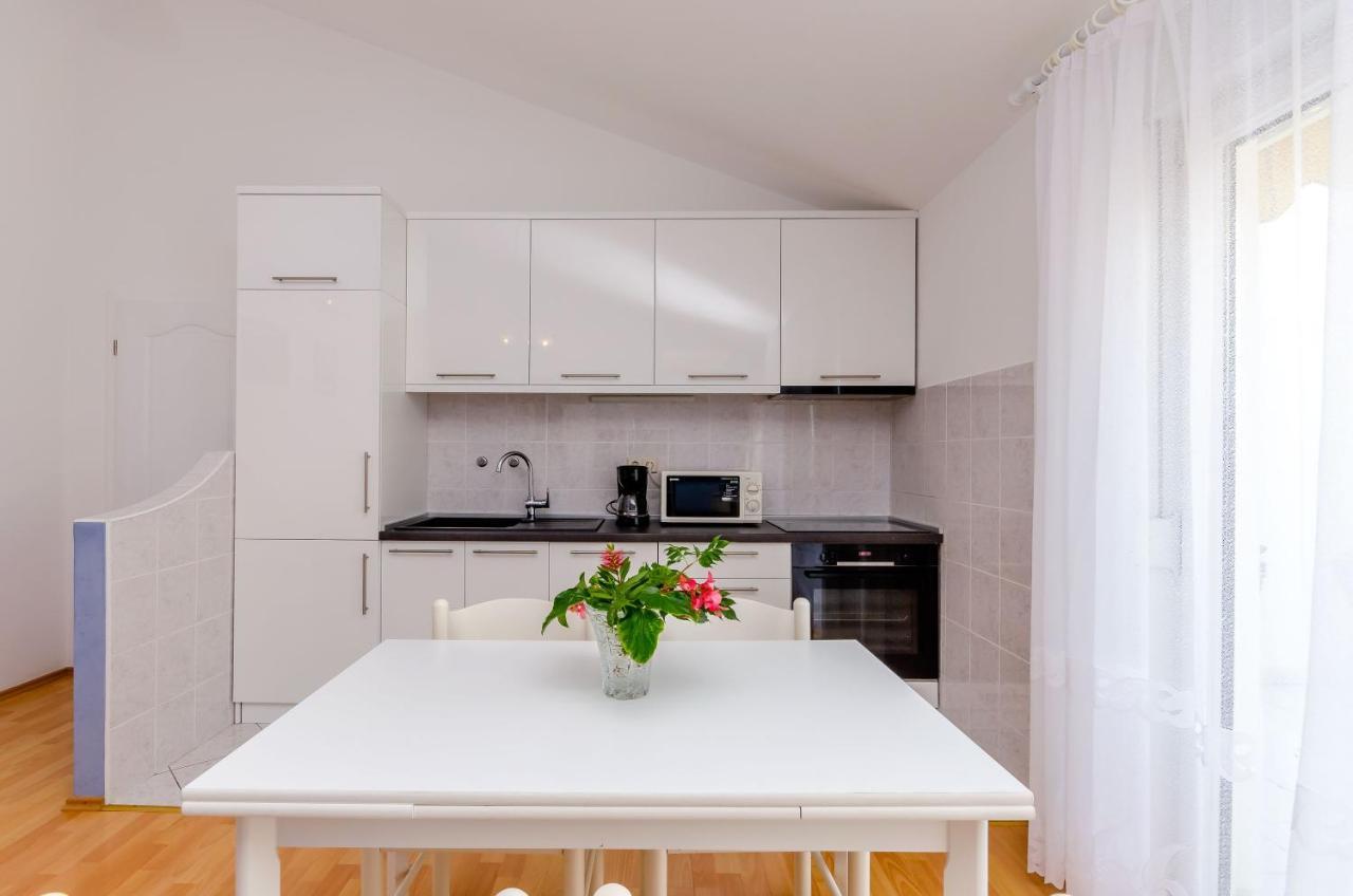 Apartments Maslina โตรกีร์ ภายนอก รูปภาพ
