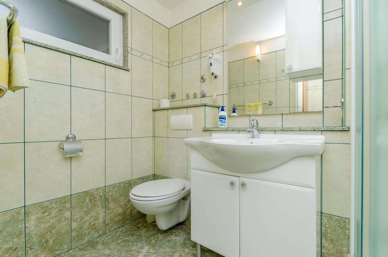 Apartments Maslina โตรกีร์ ภายนอก รูปภาพ